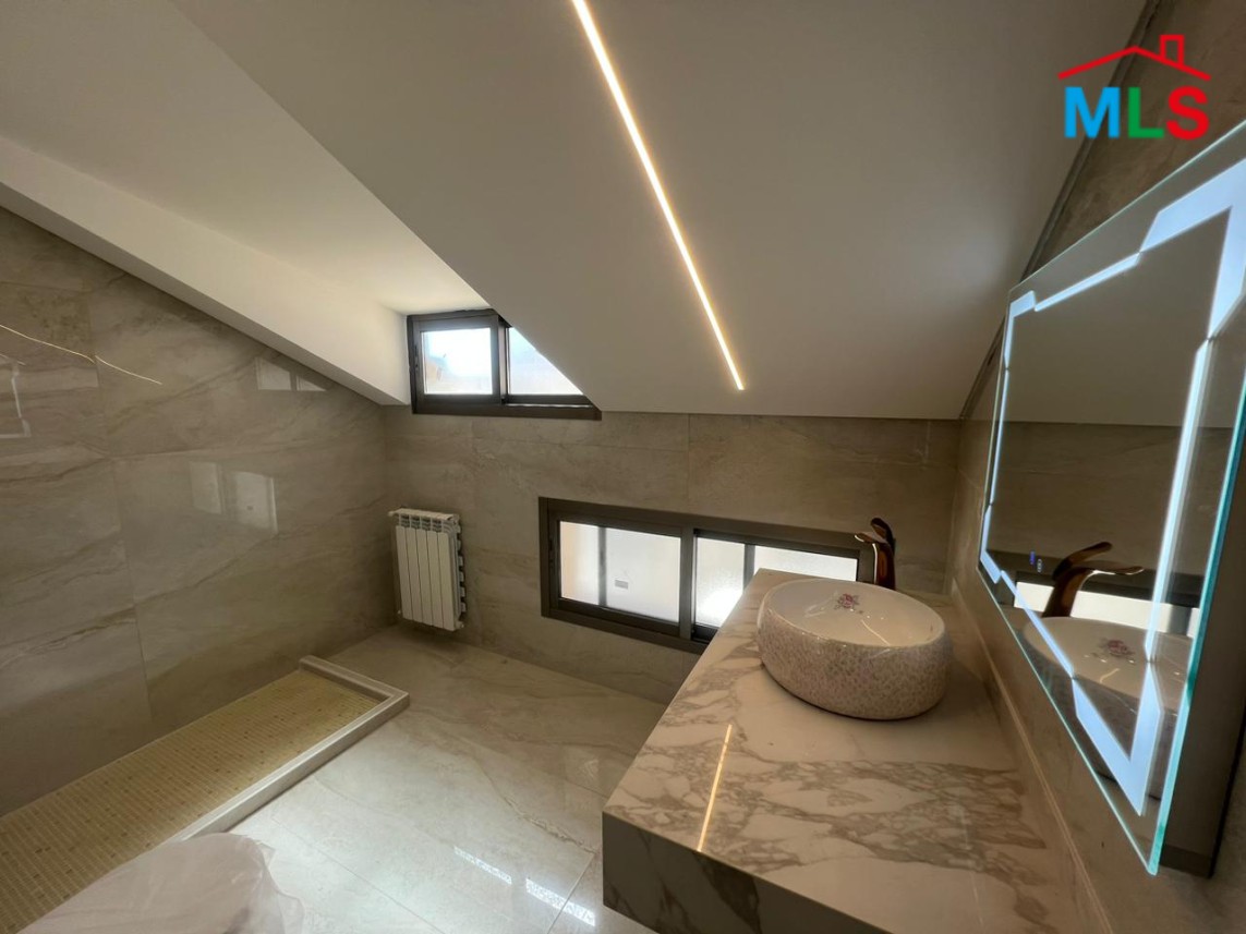 A Duplex With A Breathtaking View for Sale In Adma with A Terrace and A Garden