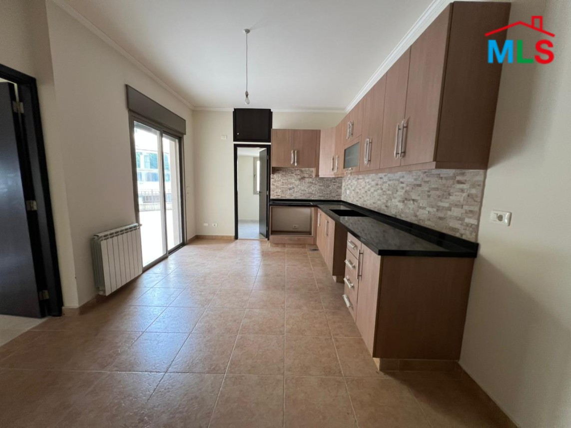 Spacious Apartment With Garden For Sale in Kfarhbeib